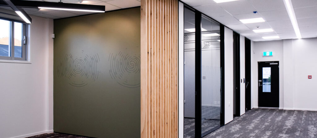 Meeting room and a timber batten feature in new office fitout